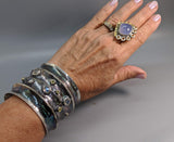 Wide Sterling Silver Cuff Bracelet with Rainbow Moonstones, Green and Yellow Diamonds in 14kt Gold Bezels