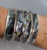 Wide Sterling Silver Cuff Bracelet with Rainbow Moonstones, Green and Yellow Diamonds in 14kt Gold Bezels