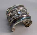 Wide Sterling Silver Cuff Bracelet with Rainbow Moonstones, Green and Yellow Diamonds in 14kt Gold Bezels