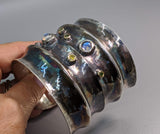 Wide Sterling Silver Cuff Bracelet with Rainbow Moonstones, Green and Yellow Diamonds in 14kt Gold Bezels