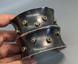 Sterling Silver Wide Anti-Clastic Bracelet with Green  Diamonds in 14kt Gold Bezels