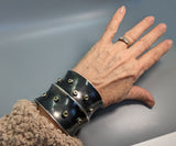 Sterling Silver Wide Anti-Clastic Bracelet with Green  Diamonds in 14kt Gold Bezels