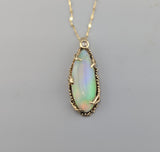 Ethiopian Opal, 14kt Gold Pendant with Rose Cut Diamond