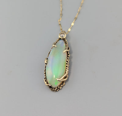 Ethiopian Opal, 14kt Gold Pendant with Rose Cut Diamond