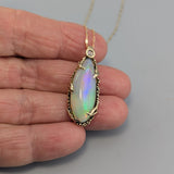 Ethiopian Opal, 14kt Gold Pendant with Rose Cut Diamond